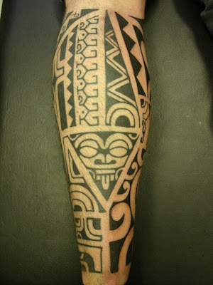 Image name: Polynesian inspired leg tattoo, backview
