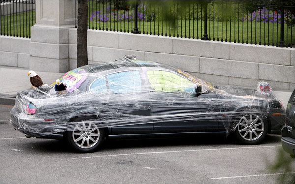 Prankster's shrink wrap Karl Rove's car