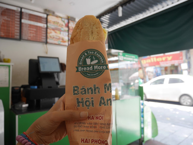 Warm and crispy Banh Mi in my hand!