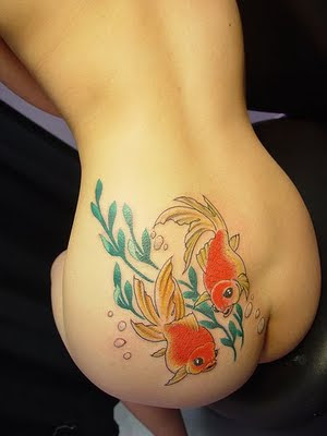 tattoos of fish. Two Fish Tattoo In The Back Of