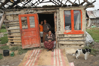 http://www.dailymail.co.uk/news/article-2424296/At-home-Roma-Remote-villages-people-struggle-terrible-poverty-continue-traditional-way-life.html