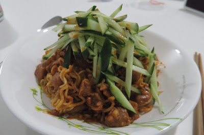 Instant noodles with spice pork cubes and crunchy peanut butter