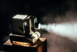 Turned On Projector Photo, by Jeremy Yap via Unsplash - https://unsplash.com/photos/J39X2xX_8CQ