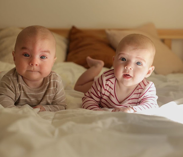 boy and girl newborn twins