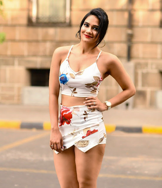 Ruchi Shah radiates confidence in a chic short dress, showcasing her bold style.