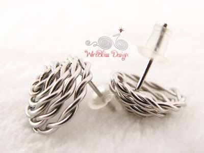 Close up of view of side and bottom of wire wrapped rose studs