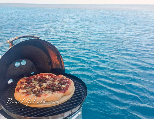 BBQ chicken boat pizza on a Magma Grill - Bahamas