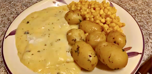 Cod in butter sauce, herby potatoes and sweetcorn