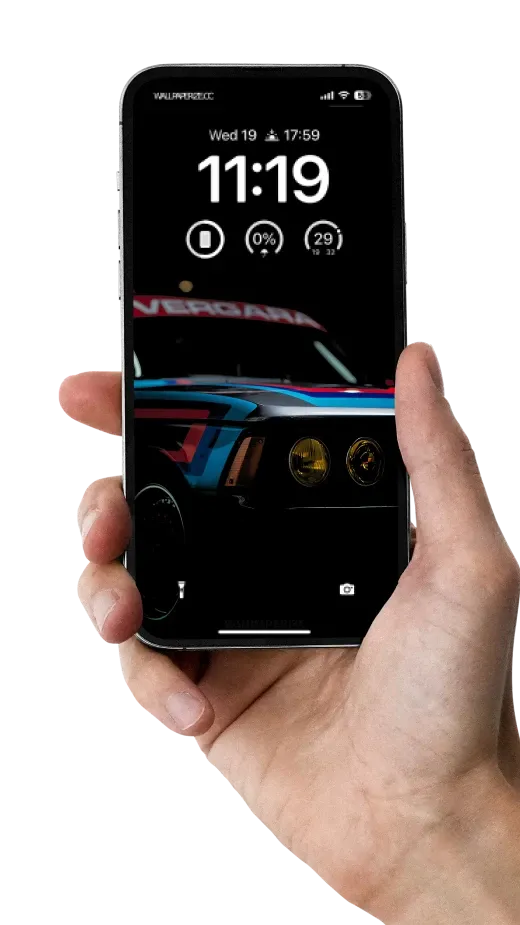 iPhone wallpaper showcasing the sleek detail of a vintage racing car with vibrant racing stripes in a dark, moody setting.