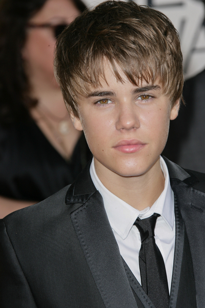 justin bieber with glasses on 2011. justin bieber wallpaper 2011