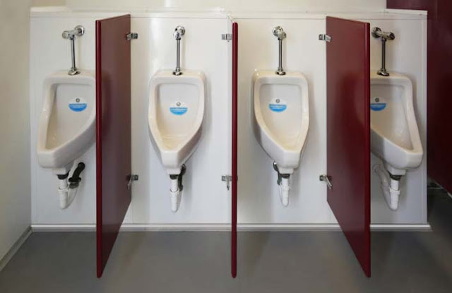Four Porcelain Urinals in Restroom Trailer