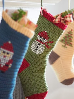 http://www.yarnspirations.com/pattern/crochet/cross-stitch-christmas-stockings