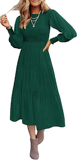 Chic green dress showcasing a vibrant hue, with a sleek silhouette that exudes a fresh and elegant style.