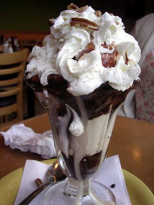  y a bigass hot fudge sundae with extra fudge and whipped cream 
