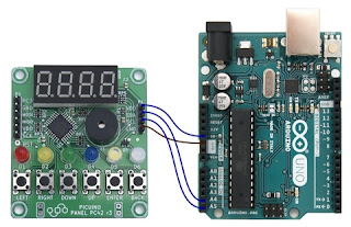 Detalle dos cables de conexión por I2C entre Picuino e Arduino