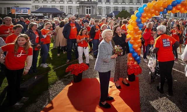 Princess Beatrix wore a blue print tweed jacket, and navy trousers. The Princess is patron of the Princess Beatrix Spierfonds