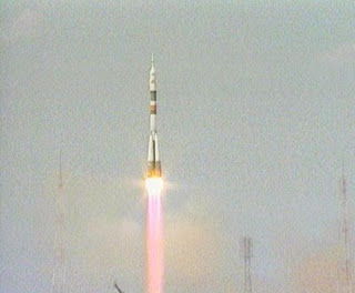 The Soyuz TMA-15 spacecraft carrying three additional crew members to the International Space Station lifts off from Baikonur