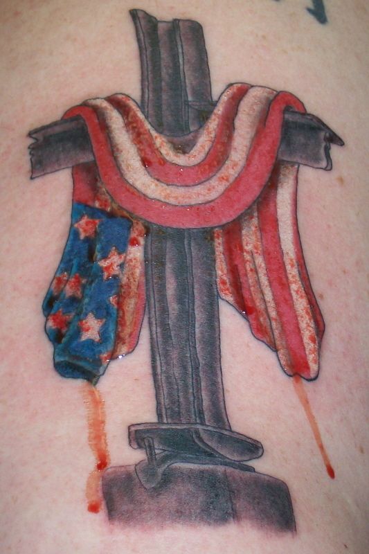 USA flag and cross tattoo.