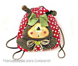 Mochila de tela vaquita de San Antonio.