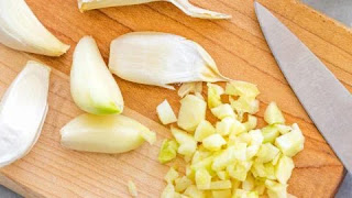 What happens if Jenin's mother chow garlic a day for seven days