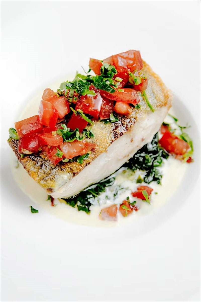 Baked Sea Bass with Fresh Tomatoes and Parmesan Cream Sauce