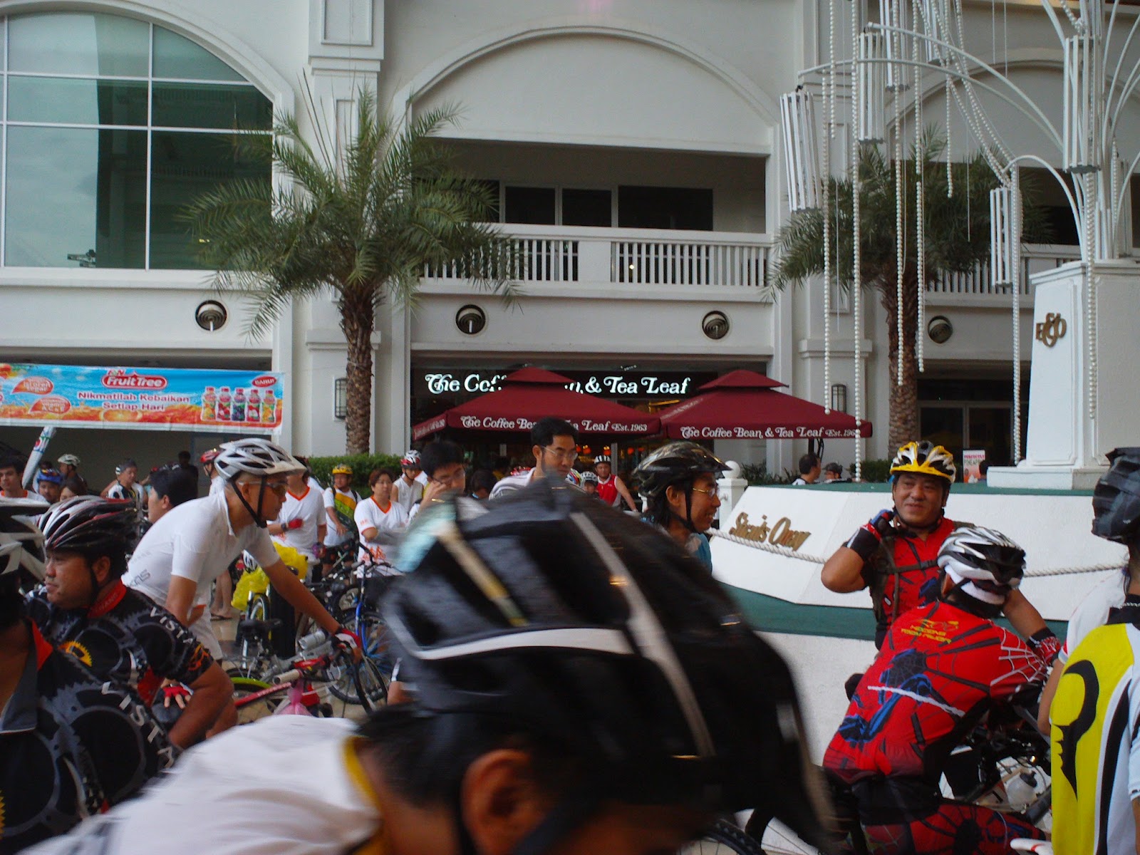 Participants lingering around Straits Quay talking and checking out ...