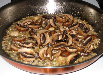 Brown mushrooms and cook out their liquid