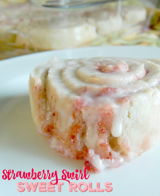 Strawberry Swirl Sweet Rolls...ready in ONE HOUR!  Sweet strawberry jam, filled into between soft dough, then glazed with a sweet almond frosting! (sweetandsavoryfood.com)