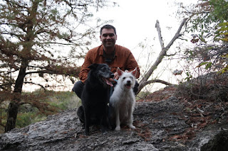 Angela, BeeGee, and Jarrett posing on a huge rock on the Blinn River Trail