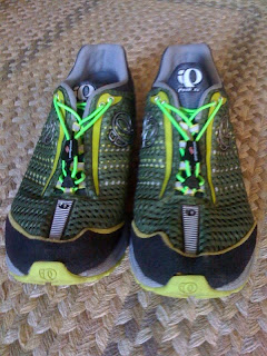 Yankz! installed on my running shoe of choice, notice I chose neon green which has been proven to be more aerodynamic than standard black