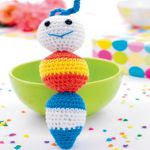 http://www.topcrochetpatterns.com/images/uploads/pattern/Crochet-caterpillar-rattle.pdf