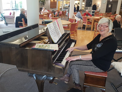 Kay Boyes playing the Schimmel grand piano