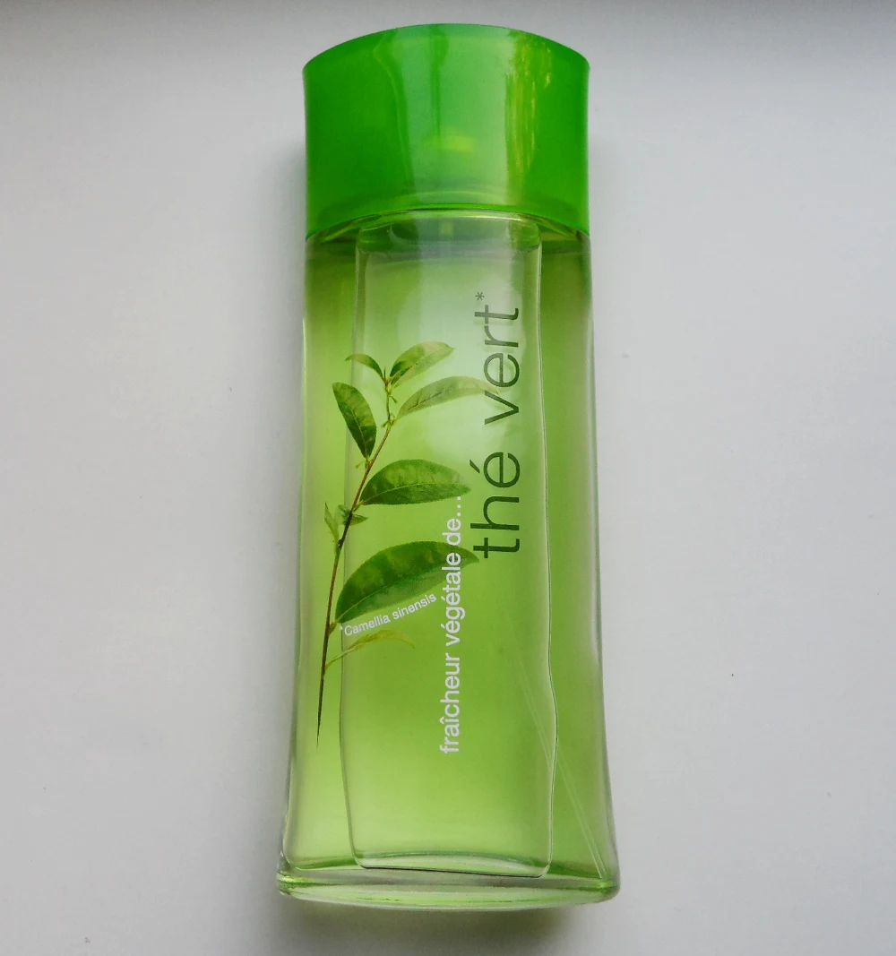 close-up shot of two beauty products: The Vert By Elizabeth Arden and Yves Rocher Toner on a white background