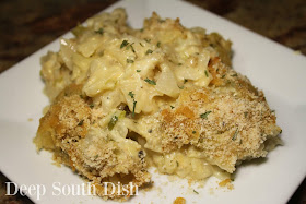 Cajun Cabbage au Gratin, also known in this area as Choux Glorieux, or Glorious Cabbage, is a casserole of cooked, chopped cabbage, made with The Trinity, milk moistened bread, cheese and finished with a bread crumb and cheese topping.