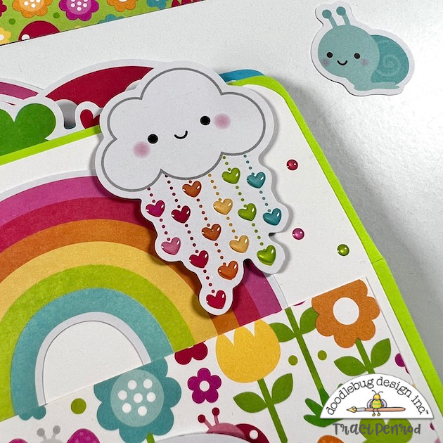 Spring scrapbook album with cloud rainbow & hearts