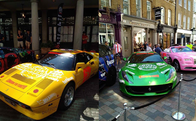 Gelber Vintage Ferrari, grüner Ferrari Superfast und rosa RollceRoyce auf Gumball 3000 Launch in London 2018