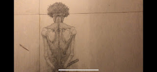 A sketch of Father Kolbe's emaciated body with his prisoner number '16620' tattooed on his back.