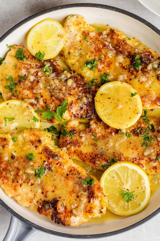 EASY 30-minute Lemon Chicken Recipe with the BEST lemon butter sauce with garlic. Enjoy the crispy parmesan chicken with butter sauce quick dinner. EASY 30-minute Lemon Chicken Recipe with the BEST lemon butter sauce with garlic. Enjoy the crispy parmesan chicken with butter sauce quick dinner.