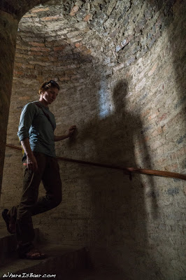 Avery Potter exploring the city, spiral stair case lady brick walls church WhereIsBaer.com Chris Baer