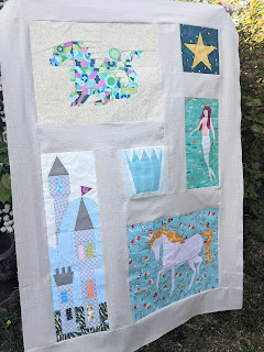 Land of Magic quilt top with fairytale foundation paper pieced blocks between sashing, Kidgiddy quilt pattern