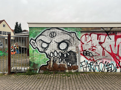 Graffiti van Nicker tegenover station Arnhem Presikhaad