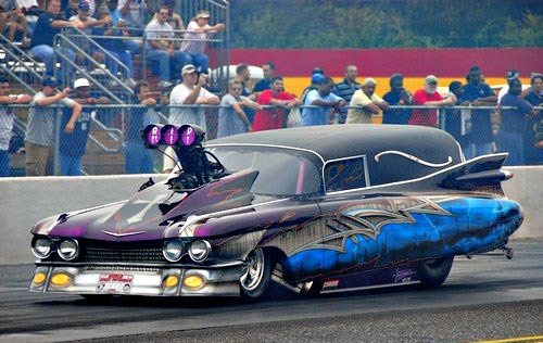 drag racing Caddy hearse 2007 wet track