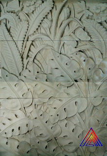 Relief batu alam paras jogja motif bunga / kembang.