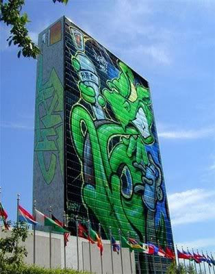 Painting Graffiti Alphabet in Green Building