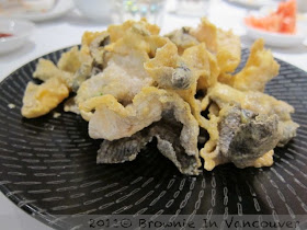 Deep Fried Salmon Skin Coated with Salted Egg