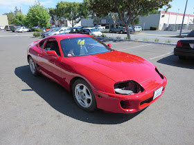 New paint on 1995 Toyota Supra at Almost Everything Auto Body--customer wants to reassemble himself