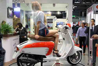 sexy girls on scooter motor