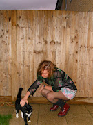 I think I may be turning into a crazy cat lady, except it is not my cat and .