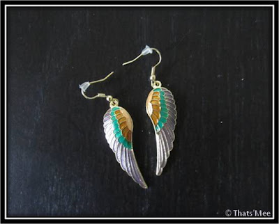 Boucles d'oreilles plume bala booste