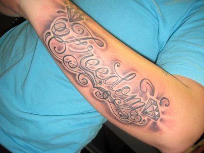 sick tattoos. name tattoos on forearm.